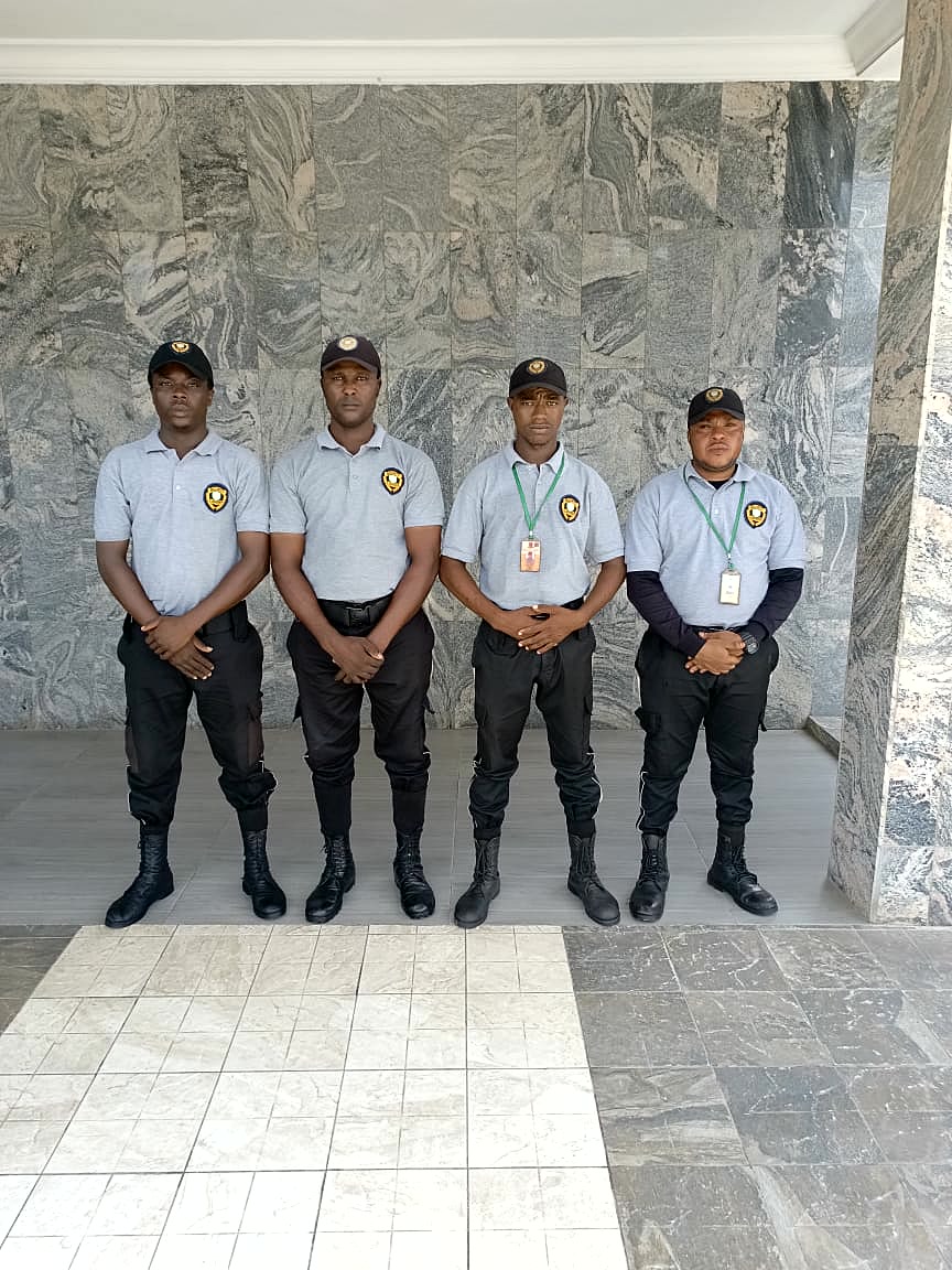 Sarf Guards officers at a corporate building lobby