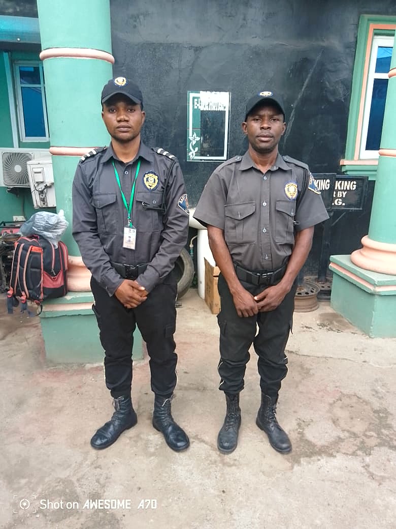Sarf Guards officers at a facility entrance