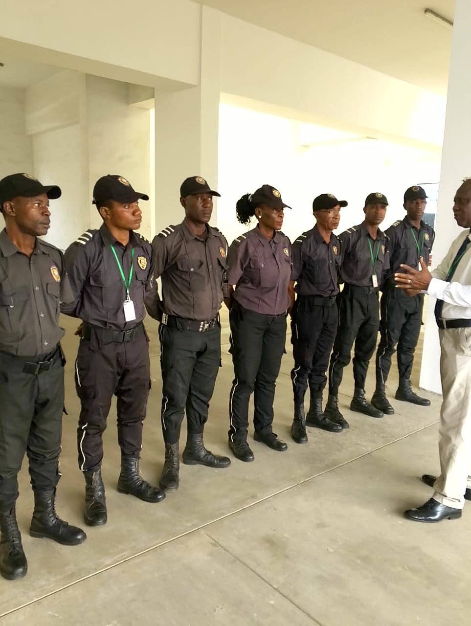 Sarf Guards supervisor conducting a guard inspection and briefing